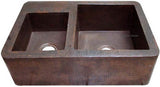 copper kitchen sink with apron and left bowl smaller