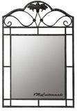 Artisan Crest Wrought Iron Wall Mirror with a large rectangular reflective surface framed by a black iron grid design, featuring curved scroll accents and a decorative crest at the top for a handcrafted ornamental look.