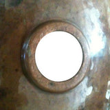 back view of copper bathroom sink hammered in round shape