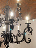 black iron chandelier detail view