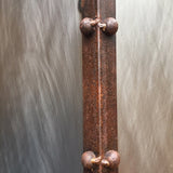 iron hood detail showing rusted straps