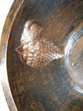 round copper drop-in bathroom sink design detail